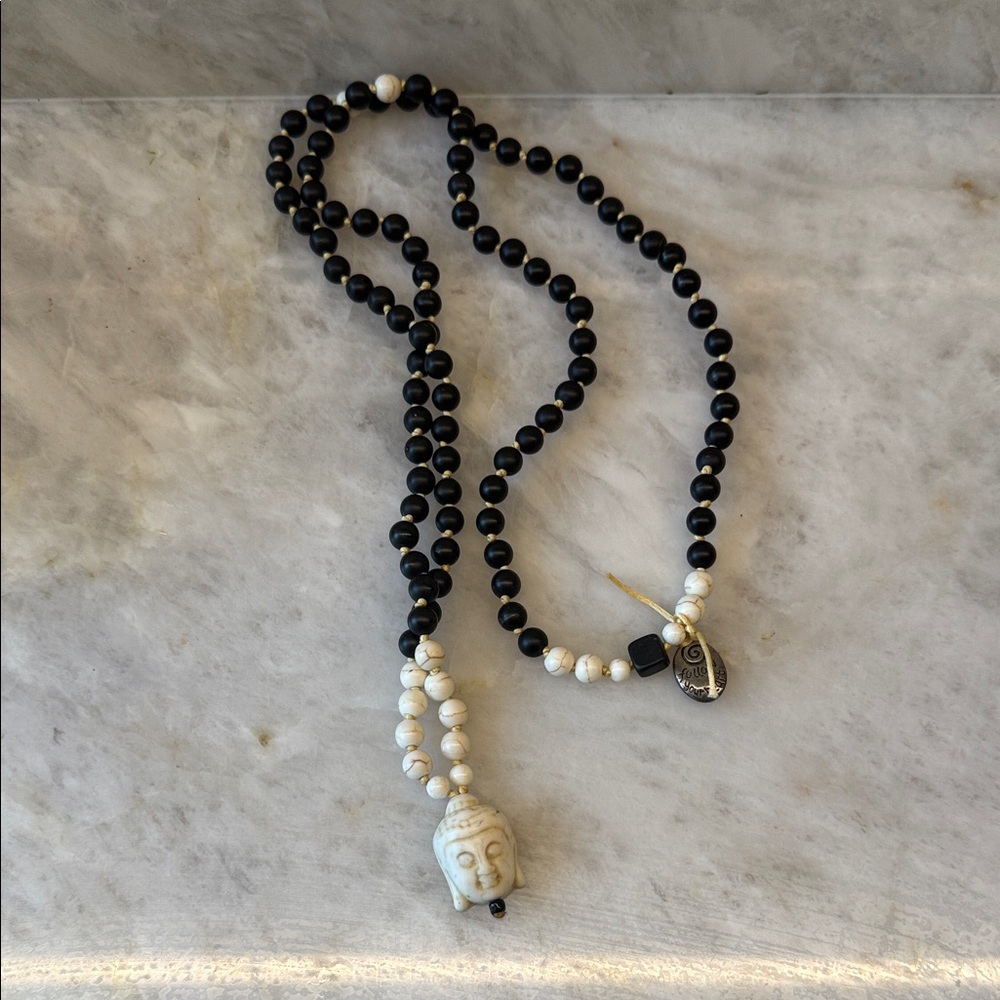 Mala Beaded Necklace, Onyx/Ivory with Buddha Pendant. Follow Your Heart charm.